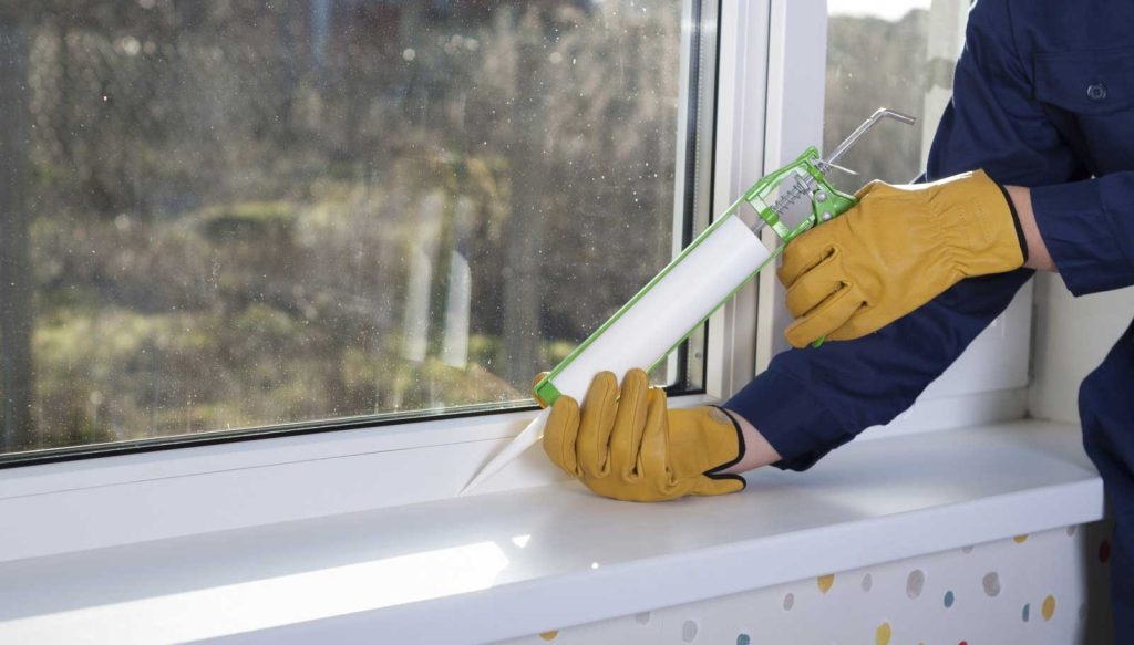 Liberty Roofing Window & Siding caulking window