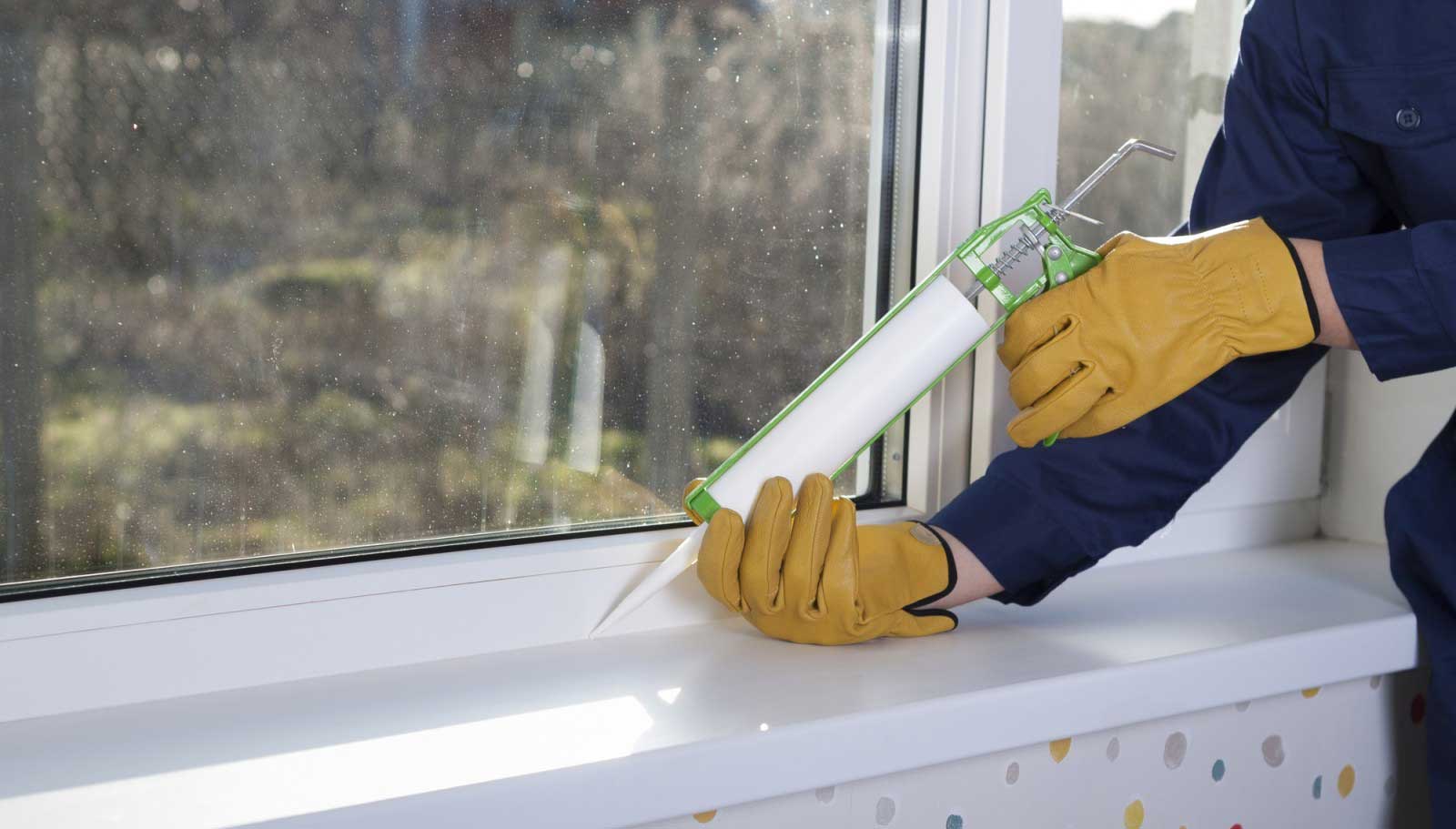 Liberty Roofing Window & Siding caulking window